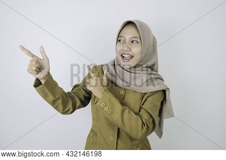 Smile Government Worker Women Pointing Beside. Pns Wearing Khaki Uniform.