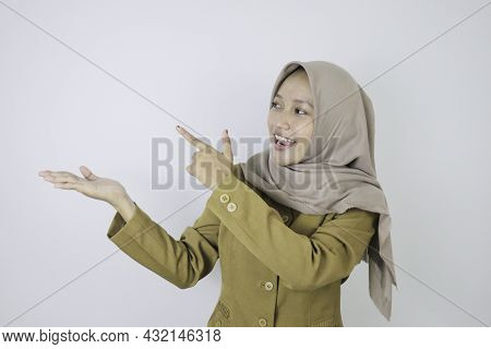 Smile Government Worker Women Pointing Beside. Pns Wearing Khaki Uniform.