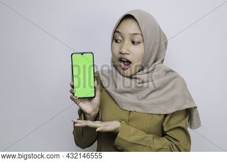 Shock Government Worker Women Showing Blank Screen On Smartphone. Pns Wearing Khaki Uniform.