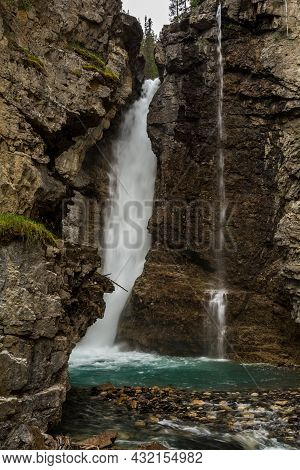 Waterfall At The Johnston Canyon In Banff. Johnston Canyon, Alberta, Canada