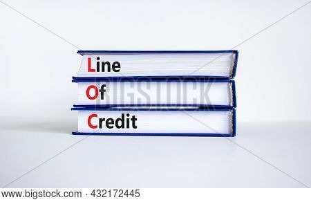 Loc, Line Of Credit Symbol. Books With Words 'loc, Line Of Credit'. Beautiful White Background, Copy