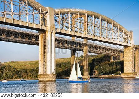 The Tamar Bridge (road) With The Royal Albert Bridge (railway) Crossing The Tamar River Between Corn