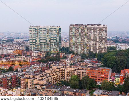 Aerial panorama view of Brussels-Capital Region and HLM suburban area in the foreground. View from Ganshoren municipality during grey sunset