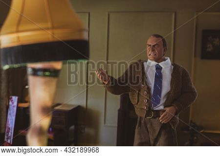 SEP 1 2021: recreation of a scene from 1983 movie A Christmas Story - the Old Man and the Leg Lamp - Neca action figures