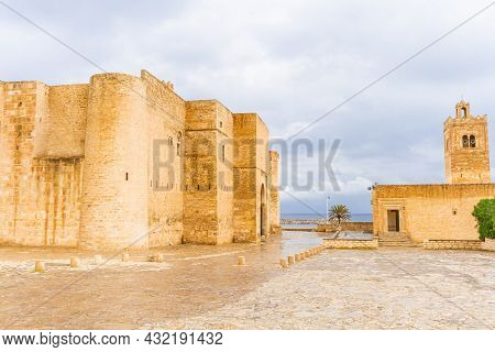 The Huge, Majestic Walls And Towers Of Ribat Fortress On A Rainy Day. Ribat Is An Architectural Jewe