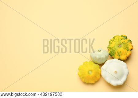 Fresh Ripe Pattypan Squashes On Beige Background, Flat Lay. Space For Text