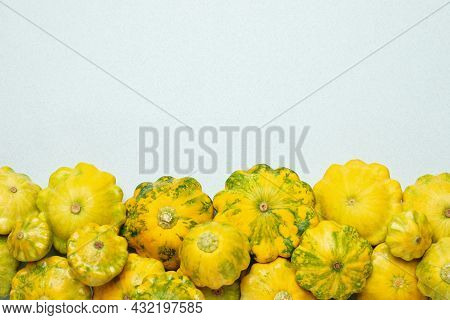 Fresh Ripe Pattypan Squashes On Light Background, Flat Lay. Space For Text