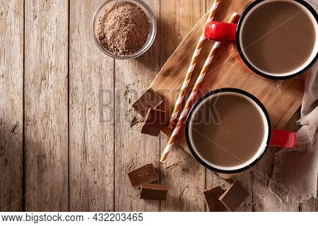 Traditional Mexican Chocolate Atole Drink On Rustic Wooden Table. Top View. Copy Space