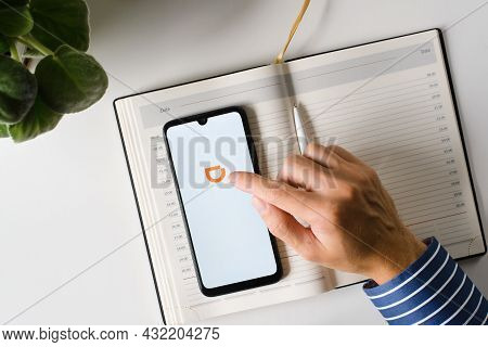 Didi Logo On Smartphone Screen, Mobile Application Chinese Company Of Taxi Services, Car Sharing. To