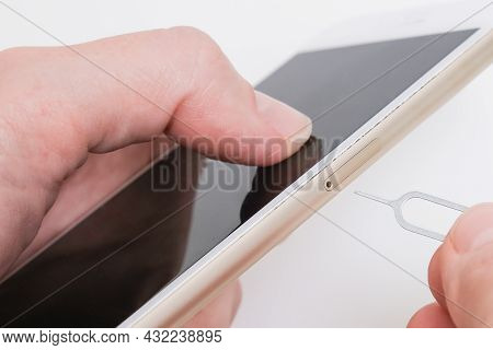 Removing A Sim Card Out Of A Smartphone, Replacing Simcard And Changing Number