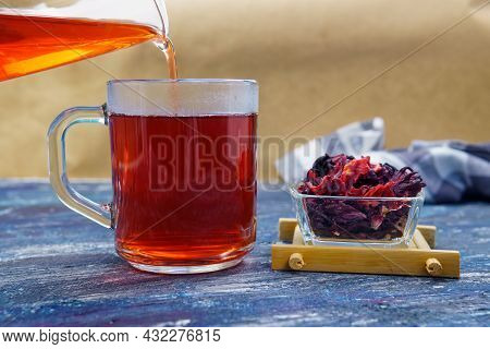 Red Hibiscus Herbal Tea Red Hibiscus Flower And Dried Herbal Tea.
