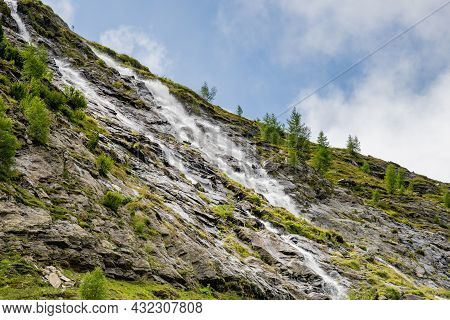 Wild Alpine Waterfall On Schlatenbach Mountain Stream. Gschloesstal Valley, Hohe Tauern National Par