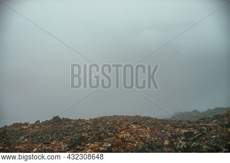 Empty Stone Desert Near Abyss Edge In Thick Fog. Zero Visibility In Mountains. Edge Of Abyss In Dens