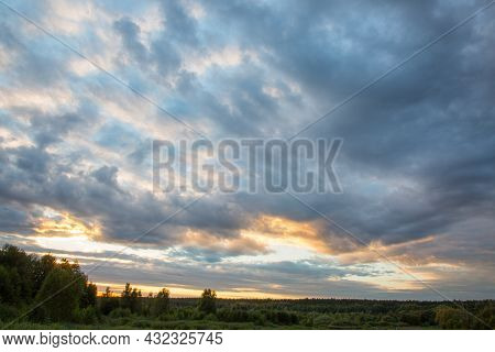 Large Clouds In Cloudy Weather At Sunset
