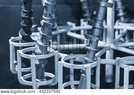 The Cam Shaft  Parts On The Conveyer Belt To Oven For Stress Release Process. The Automotive Parts M
