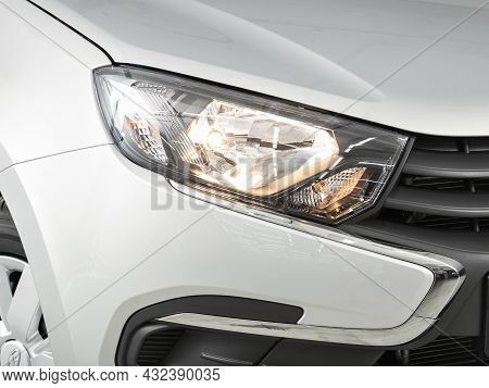 Novosibirsk, Russia - July 19, 2021: Lada Granta , Close Up Of The Car Detailing: Beauty Clean Headl