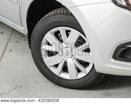 Novosibirsk, Russia - July 19, 2021: Lada Granta , Car Wheel On White  Car - Close Up