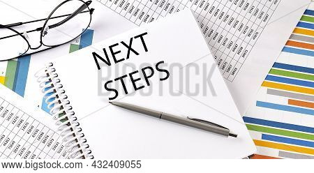 Notebook With Text Next Steps . Diagram And White Background,business