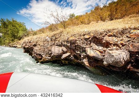 Riverbank On The Middle Asian River Showing Signs Of Bank Erosion And Instability.