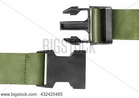 Plastic Fastex Buckle On Green Textile Belt Closeup On White Background