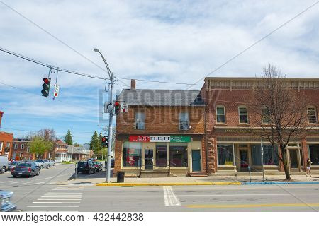 Potsdam, Ny, Usa - Apr. 27, 2017: Historic Sandstone And Brick Commercial Buildings With Italianate 