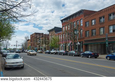 Potsdam, Ny, Usa - Apr. 27, 2017: Historic Sandstone And Brick Commercial Buildings With Italianate 