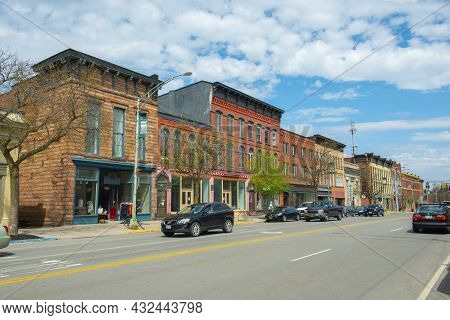 Potsdam, Ny, Usa - Apr. 27, 2017: Historic Sandstone And Brick Commercial Buildings With Italianate 