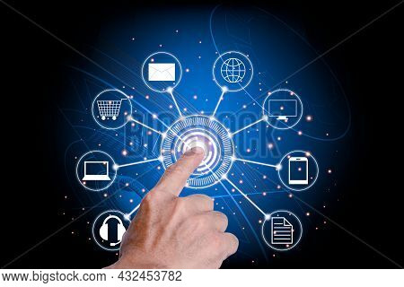 The Man's Hand Pointing To Press The Center Of The Hitech Circle Symbol. The Meaning Of Online Commu
