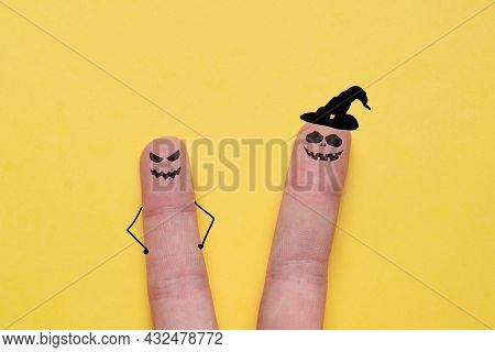 Spiteful Faces Painted On The Fingers. Halloween Holiday