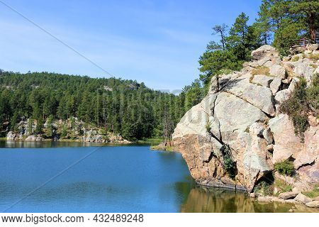Granite Rocks Bluffs Overlooking An Alpine Lake Taken At A Pine Forest In Horse Theif Lake, Sd Withi