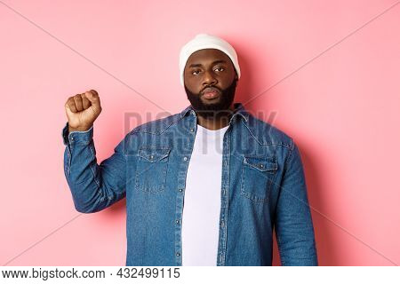 Serious And Confident African-american Male Activist, Raising Fist, Support Black Lives Matter Blm M