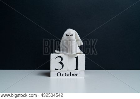 Spiteful Ghost Next To October Calendar With Copy Space. Halloween Holiday