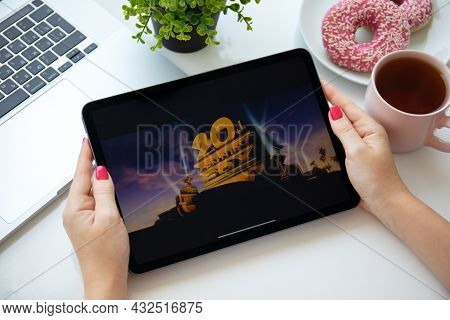 Alanya, Turkey - August 6, 2021: Woman Hand Holding Apple Ipad Air Space Gray With Multinational Ent