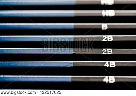 Selective Focus On 2b Pencil On Full Set Of Black And Blue Writing And Drawing Graphite Pencils Sort