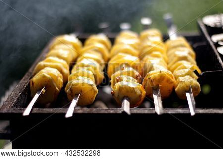 Photos Of Delicious Potatoes On Skewers In The Grill