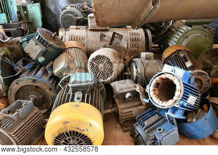 Old Disassembled Electric Motor In A Warehouse For Repair.