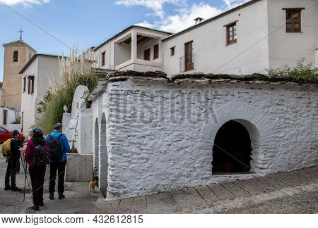 Group Of Hikers Next To The Public Laundry Of Ferreirola