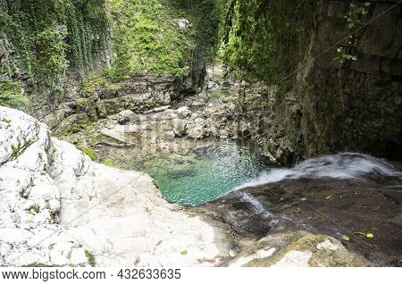 The Olginsky Waterfall In The Republic Of Abkhazia. Cloudy Day On May 21, 2021