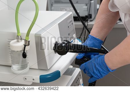Preparation Of Equipment For The Medical Examination Of Video Gastroscopy. The Hands Of A Medical Wo