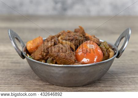 Bhuna Flavored Lamb Meat In A Bowl From Indian Restaurant Cooked And Seasoned Perfectly.