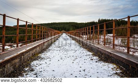 A Snow Covered Old Railway Viaduct At The Big Water Of Fleet At The Cairnsmore, Leading Into The Gal