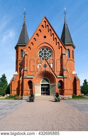 Red Brick Building Of The Sankt Petri Kyrka, Or Saint Peter Church, In Vastervik, Sweden, On A Sunny