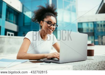 Successful Black Student Girl Using Laptop Learning Online Outdoor