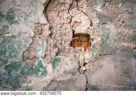 The Old Wall With Peeling Plaster Colored