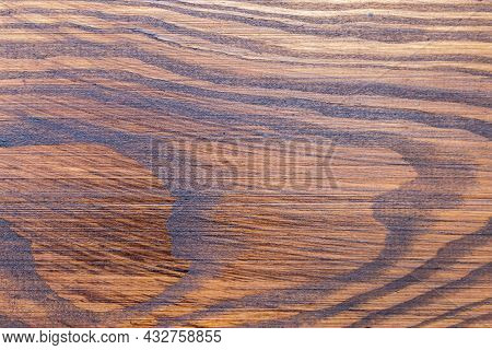 Fragment Of Roughly Handled Pine Plank Covered With Mordant Close-up, Texture, Background