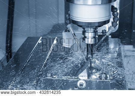 The Cnc Milling Machine Cutting The  Mold Parts With Oil Coolant Method. The Mold And Die Manufactur