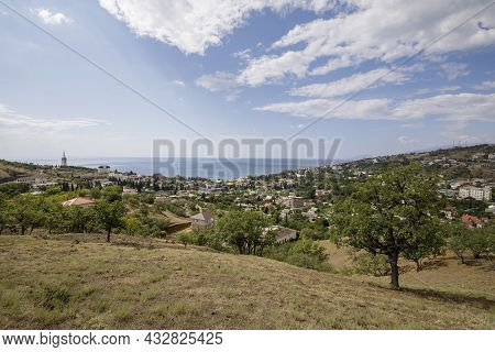 Malorechenskoye Village, Crimea, August 15, 2021: View Of The Malorechenskoye Village And The Black 