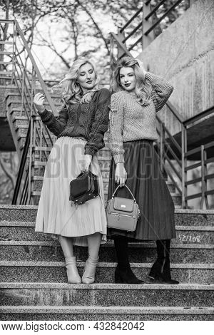 Sweater Skirt Trend. Completing Each Other. Vogue Concept. Girls Blonde Wear Matching Clothes. Match