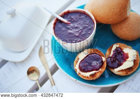 Toasted Buns With Fresh Butter And Plum Jam