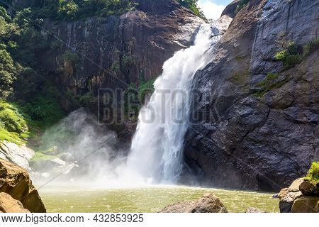 Dunhinda Waterfall In A Sunny Day In Sri Lanka